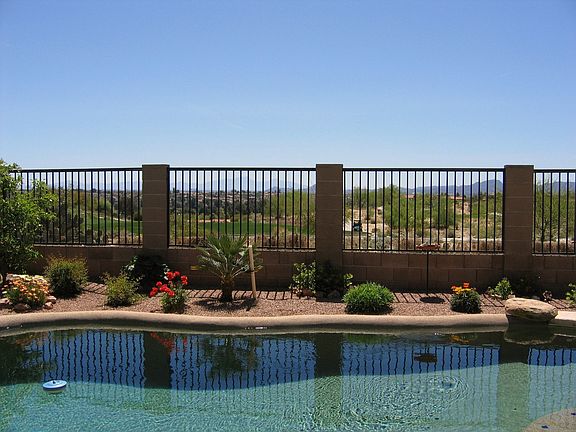 Backyard overlooks Omni Tucson National Golf Course. View of downtown Tucson.