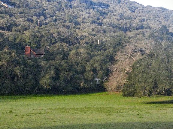 Looking at house from meadow