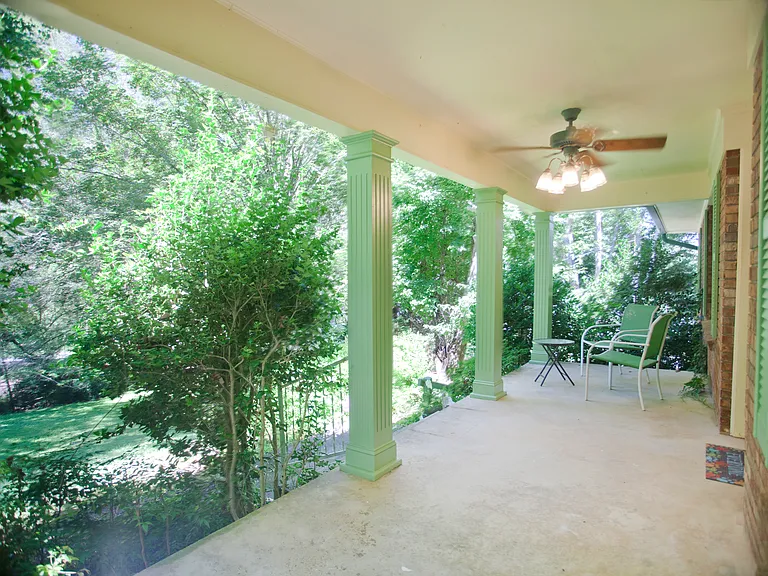 Lovely, front porch perfect for relaxing.