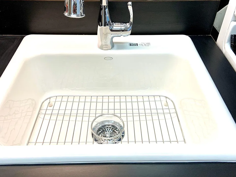 New Cast Iron Enameled Kohler sink, new Moen faucet