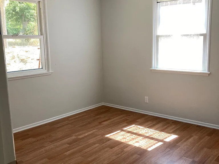North Bedroom with Energy Star ceiling fan and dimmable overhead light.