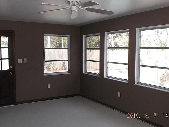 Solarium under air overlooks pool area.