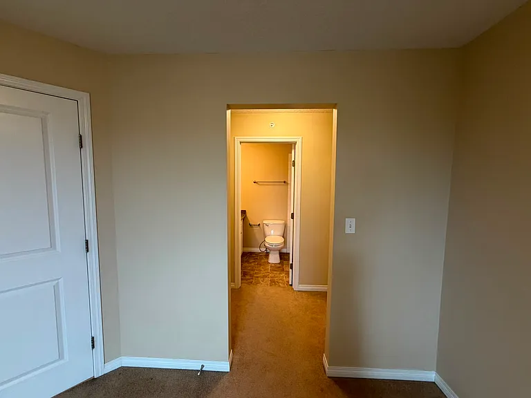 Master bedroom with walk in closet and private bathroom
