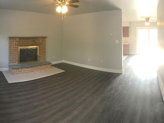Panorama of view in front door - living room and view into dining room