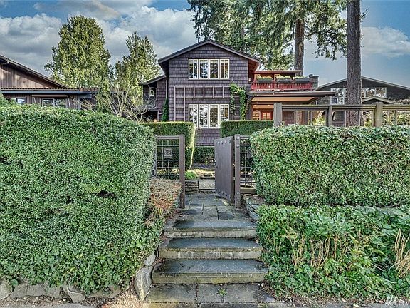 Enter the artisan gate and feel yourself transported back to a simpler, gentler era...  Make sure to click on the virtual tour link to experience this home in a 3D Walk-Through tour.