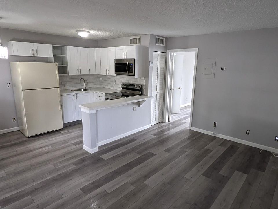 The matching stainless steel refrigerator will arrive in 3 weeks. Electric outlets are being upgraded. The missing cabinet door will be also installed this week