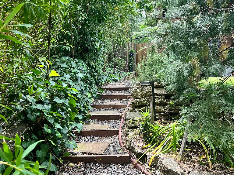 This is the private pathway leading to entry. There is an alternative shared stairway pathway as well.