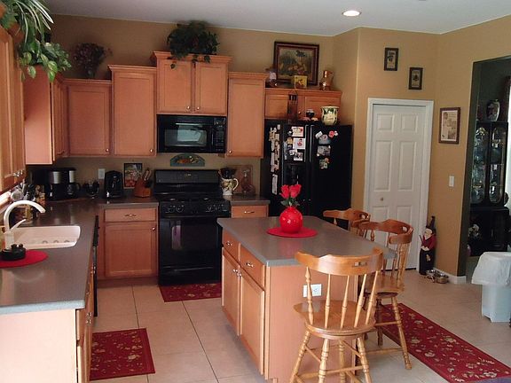 Large kitchen with island; formal dining room to right