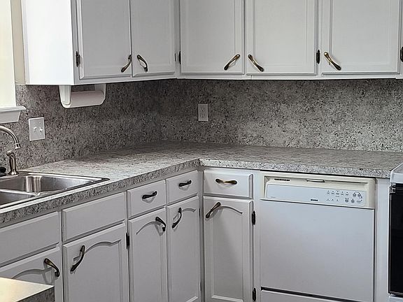Kitchen new countertops and fresh paint.
