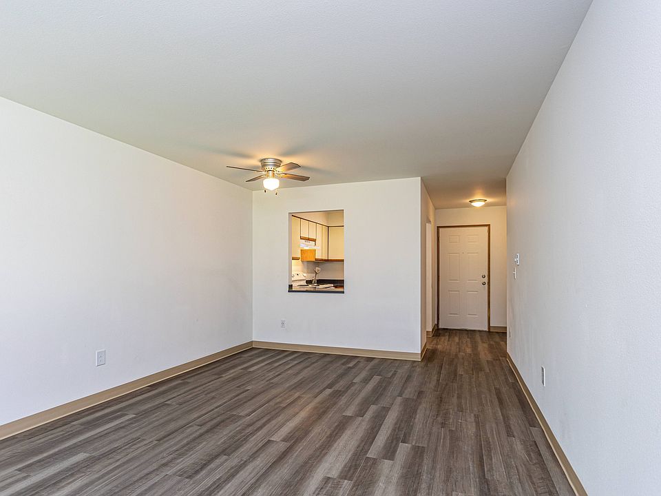 pacious Living Room with Modern Flooring at Winton Woods Apartments in Poulsbo, WA