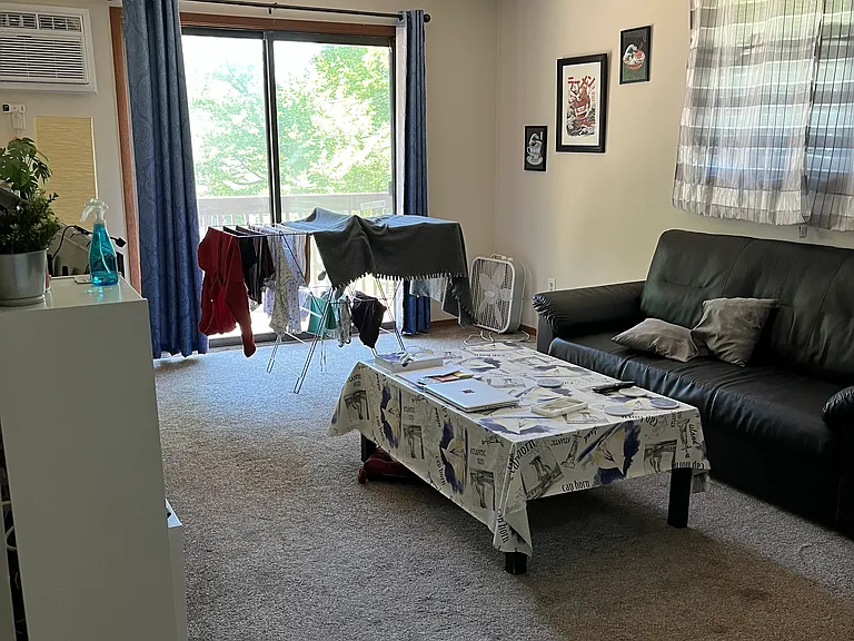 living room with sliding glass door to a deck