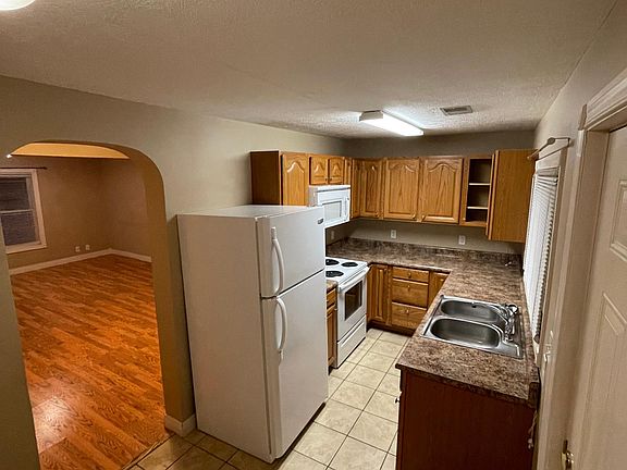 kitchen with washer dryer hook up also