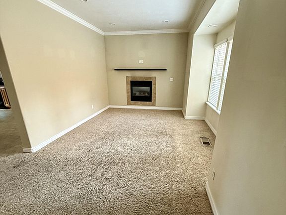 Main floor front room with fireplace