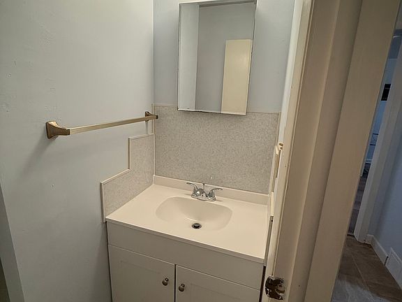 Bathroom sink, vanity and Medicine Cabinet