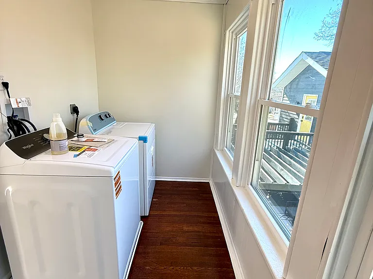Inside laundry room overlooking backyard