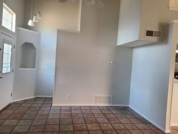 Entry with entry closet and corner shelf