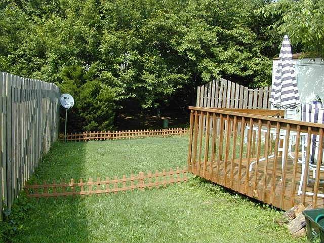 Private deck and backyard