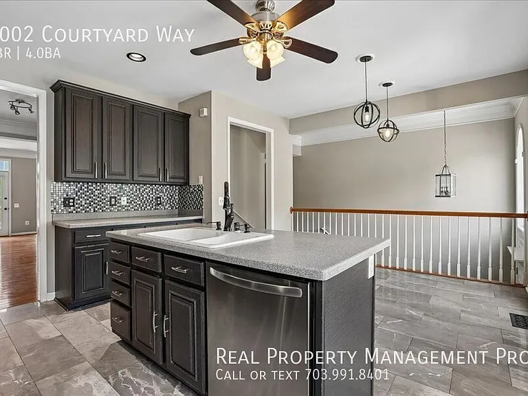 7002 Courtyard Way — Photo 17