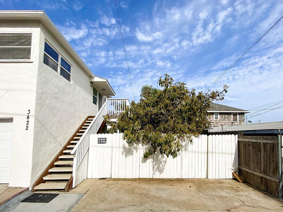 You'll love the free flowing air that moves through this second story home with great views. The home sits above a garage but is not attached to any other unit. There is room to park 2 cars and the entrance to the home is off the alley.