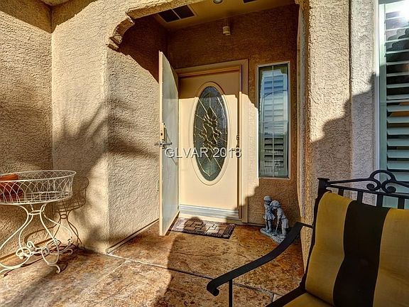 Wrought iron security door and custom beveled front door.
