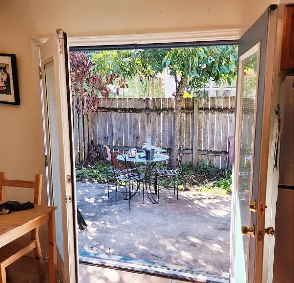 French doors leading to private back patio area
