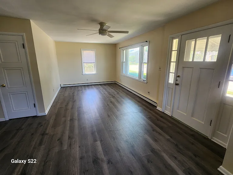 Living room area with front door.