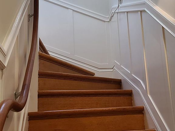 Stairs up to the top floor
