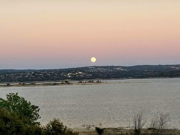 Amazing full moonrise at sunset