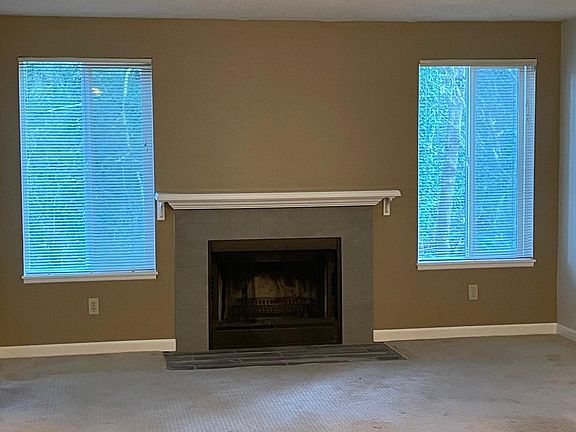 Living Room and Wood Burning Fireplace