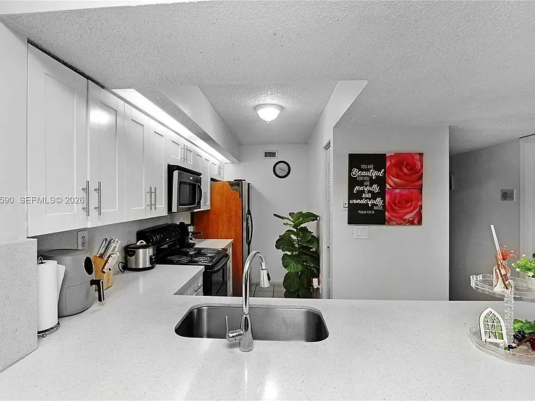8640 SW 212th St #303 — Photo 2