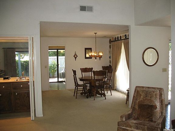 The formal dining room connects to the living room for a great flow when you are entertaining.