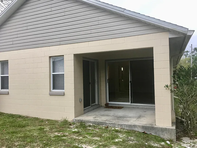 Rear view of covered patio.
