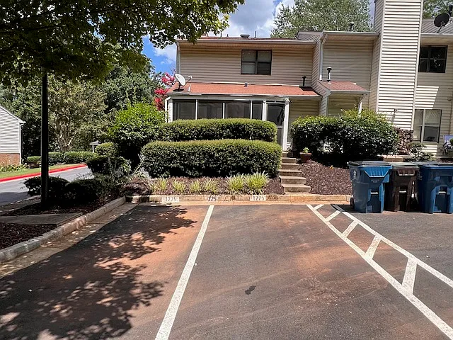 Two parking spots steps from your door