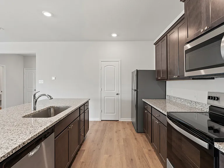 The kitchen has energy-efficient appliances.