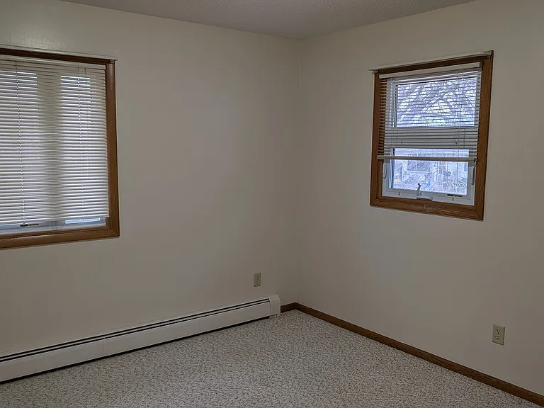Bedroom 1.
Carpet color may vary slightly.