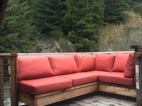 Custom cantilevered couch upon deck entry_with room for a BBQ on the deck.