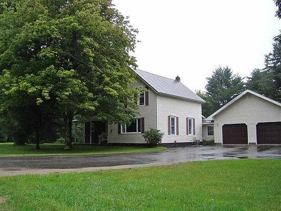 Front Views. 2 Car Garage attached through back porch.
