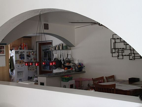 Open view from living room into kitchen