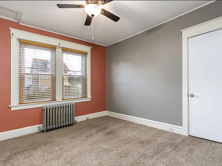 Bedroom 1 on 1st floor adjacent to dining room