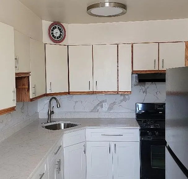 7703 Woolston Ave — Photo 3