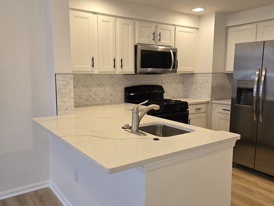 Kitchen new Counter Top, Tile and Cabinets newly Painted