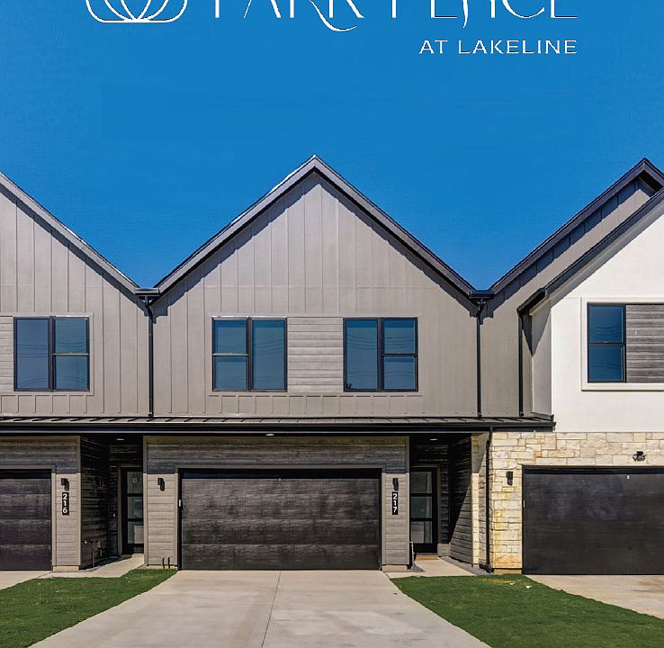 Main entrance with modern exterior and extra long driveway.