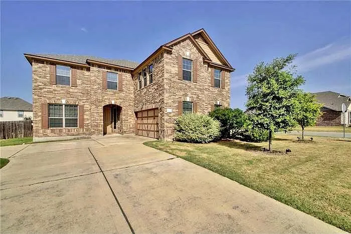 Front of the home, has good size drive way that can fit 7 cars. Two good size Garage.