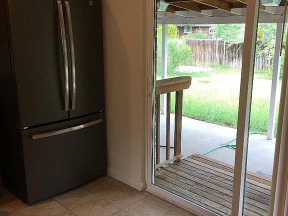Kitchen area looking it into back yard