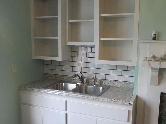 Open shelving and tile backspash