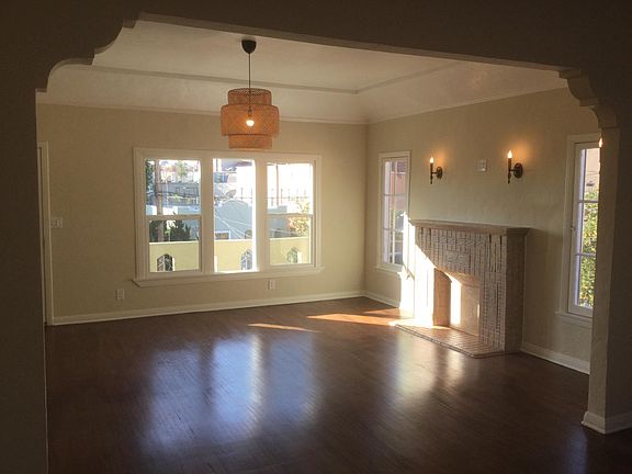 EXPANSIVE LIVING ROOM WITH VINTAGE HARDWARE