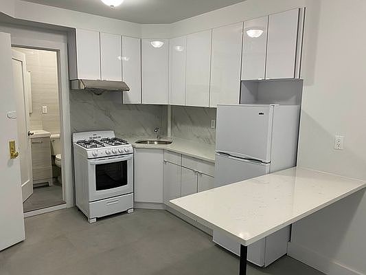 1st image of 64 E Broadway #4