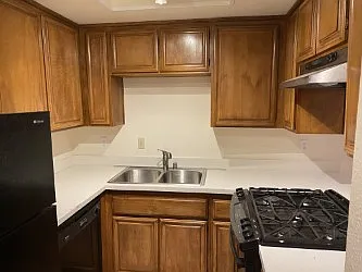 Beautiful kitchen with all appliances including gas stove.