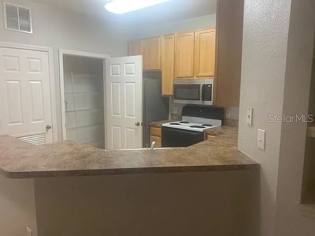 10025 Courtney Palms Blvd #204 — Photo 12