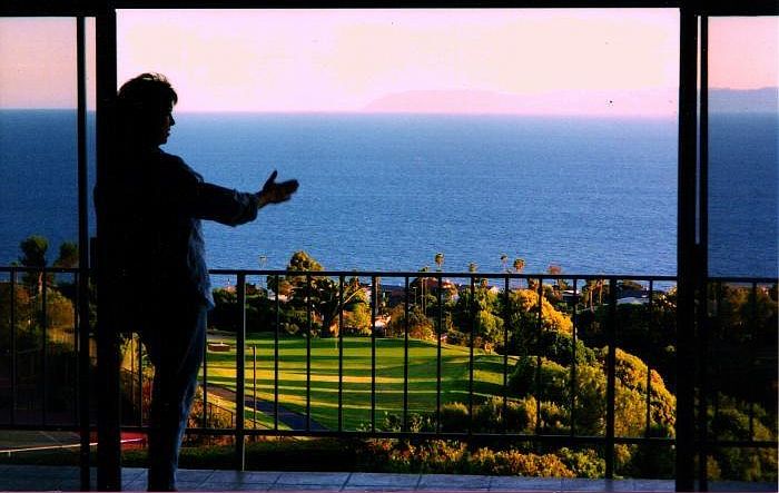 Living Room view overlooking a golf course, Pacific Ocean, Catalina Island in the distance.